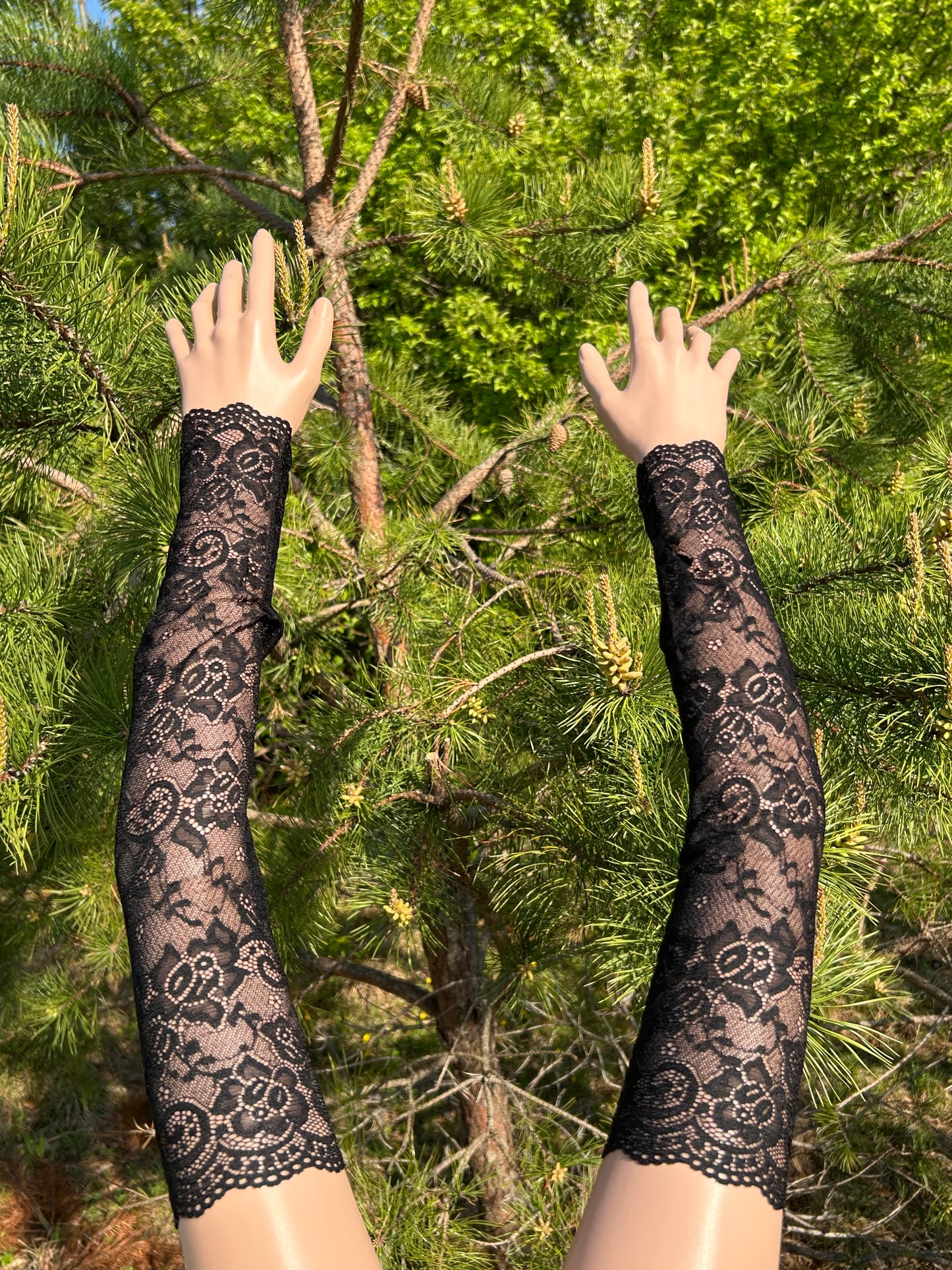 Black Gothic lace fingerless gloves with a floral lace design,